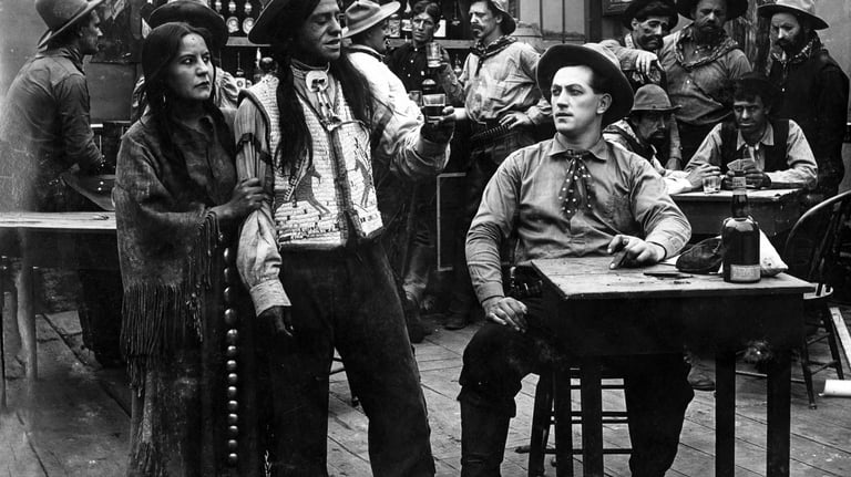 Lillian St. Cyr, also known as Princess Red Wing, standing at left with husband James Young Deer at 
