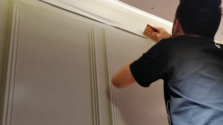 a man is wrapping a wall with a wrap job