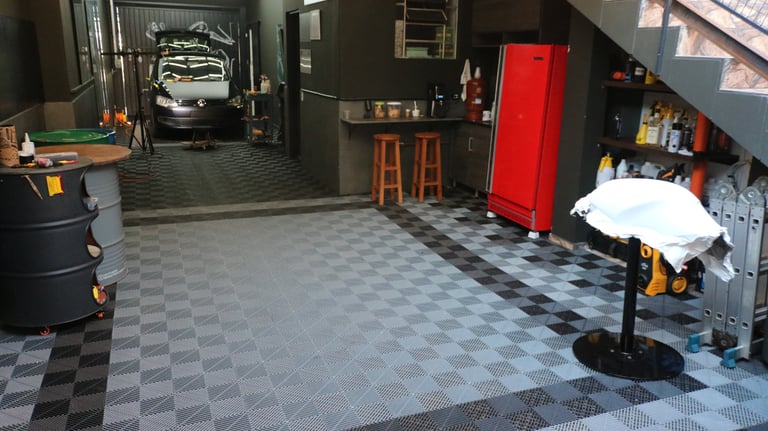 a garage with a car parked in the garage