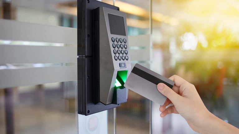 a person is holding a credit card and a credit card