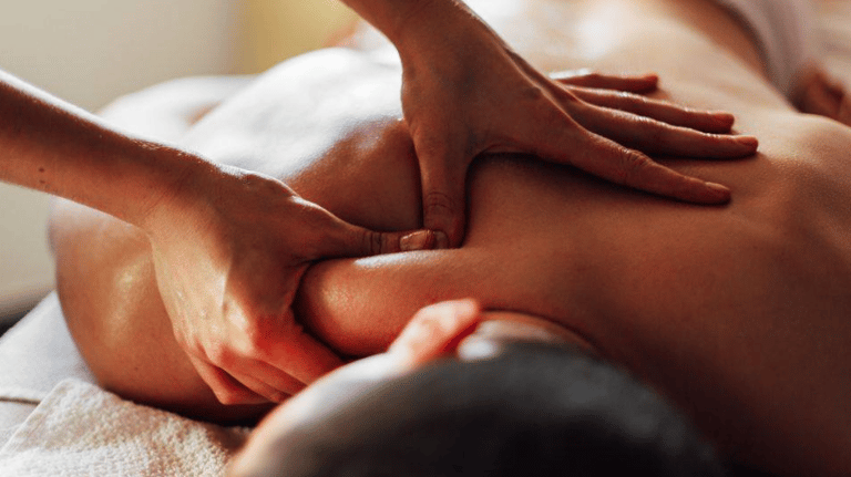 Man getting a deep tissue shoulder massage.