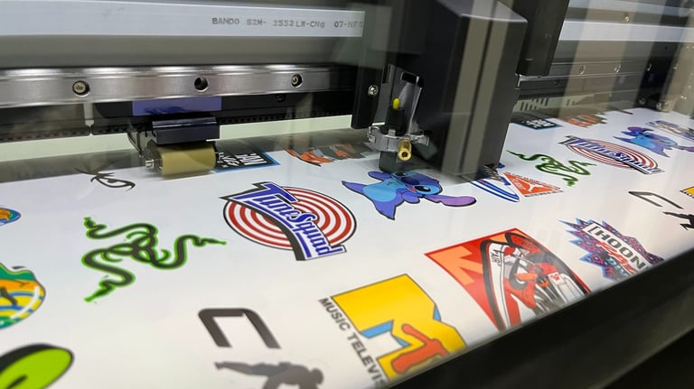a machine that is printing on a large screen