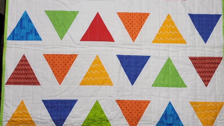 Triangle Pop Quilt Pattern by Emily of Quilty Love