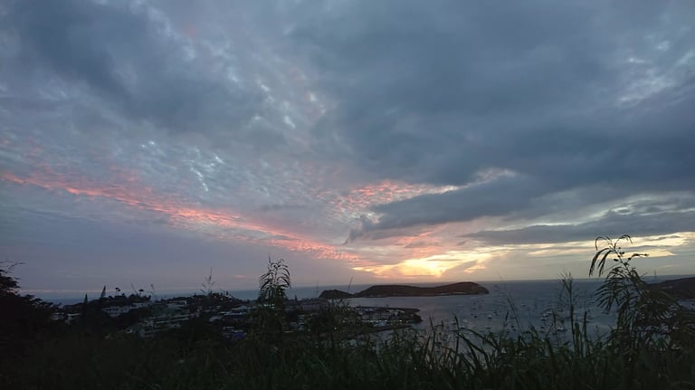 a sunset over a body of water