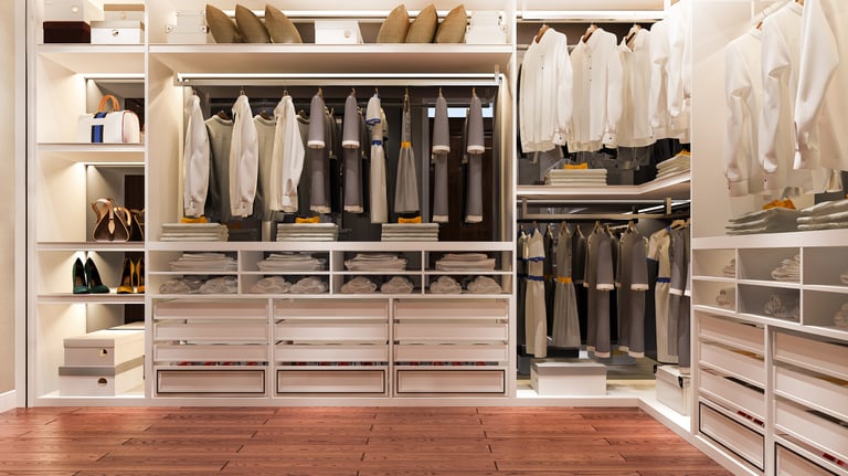 Organized closet with labeled storage and neatly arranged clothing