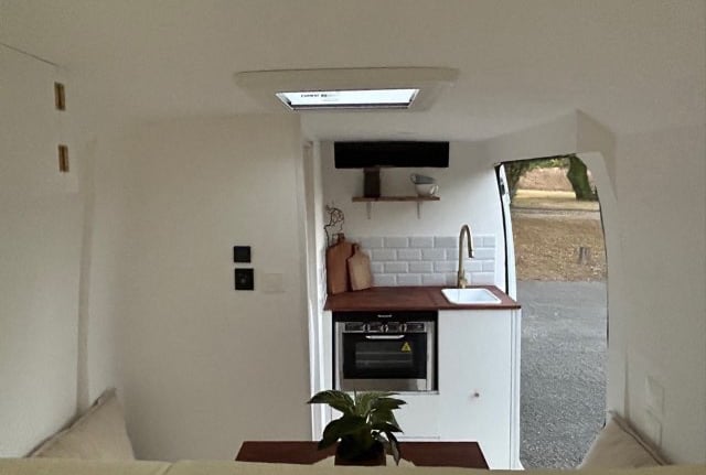 a kitchen with a small kitchenette and a small kitchen