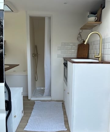 a van with a sink and a shower