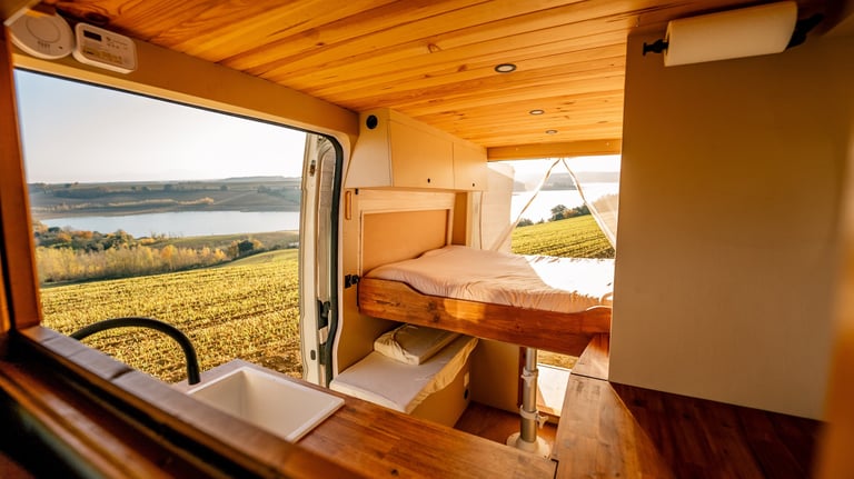 a bedroom with a bed and a sink
