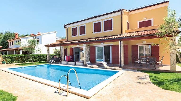 Shared outdoor pool in Volme apartment complex near Banjole