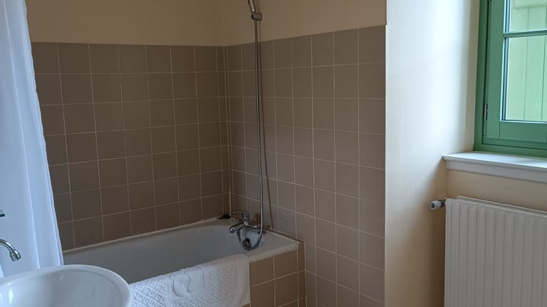 Salle de Bain avec Baignoire