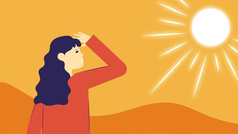 a woman standing in front of the sun covering her eyes