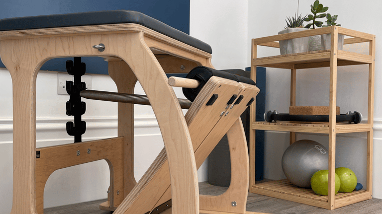 Pilates equipment including a chair and small equipment including weighted balls & magic circle