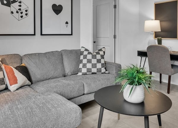 a living room with a couch and a table