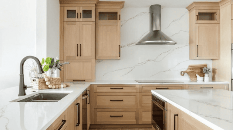 natural unfinished cabinets with quartz backsplash