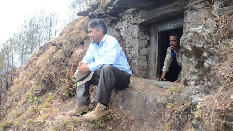 rohit thapliyal with naveen thapliyal in village punchur  in front of a cave called 'gumpha ki darr.