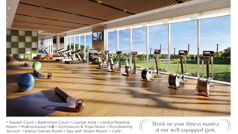 a gym room with a lot of exercise equipment