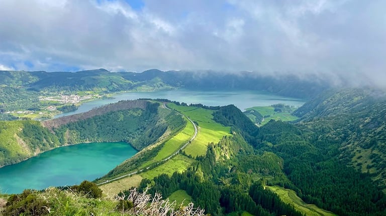 a view of a lake and mountains in the distance