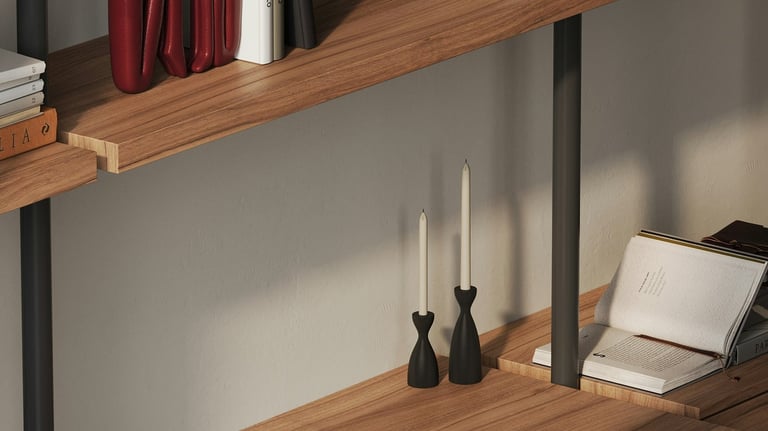 Minimalist ergonomic home office setup with dark wood desk and warm lighting.