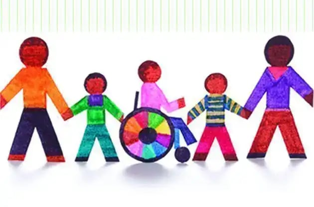 Colorful paper cutout figures holding hands including a person in a wheelchair representing diversity and inclusion.