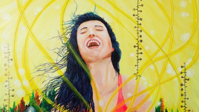 A woman laughing in joy 