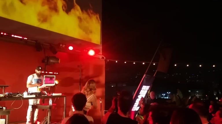 a man standing in front of a screen sound engineering for an artist live performance beirut ked 