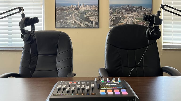 Riggs Audio mobile podcast production setup with microphone and headphones
