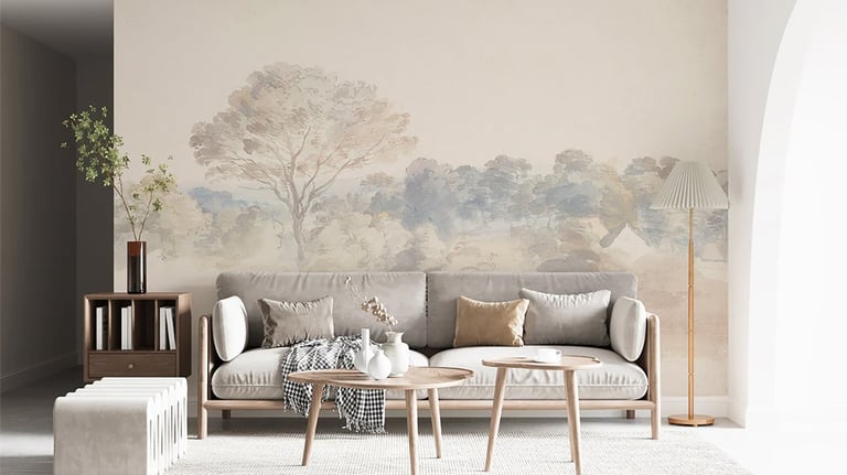 Modern living room with a landscape wall mural, grey sofa, and minimalist wooden coffee tables.