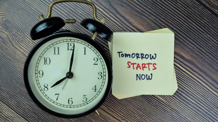 a clock with a notepad attached to it