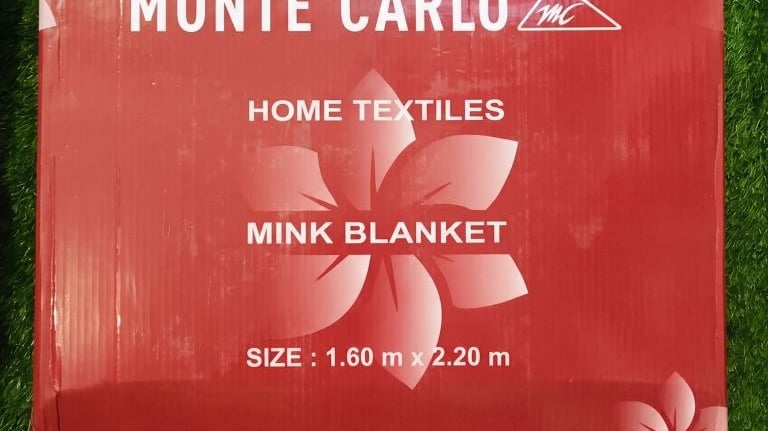 "Monte Carlo style branded blanket, soft and stylish design for retail and wholesale distribution."