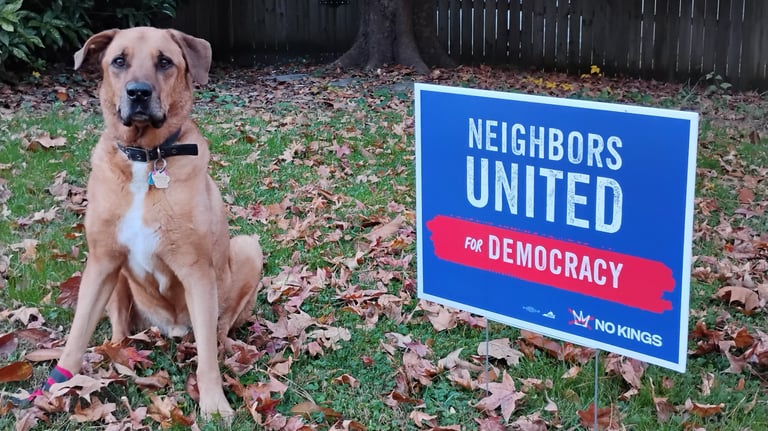 Picture of our yard sign with one of its proud supporters.