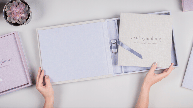 quinceanera album, a person holding a photo book