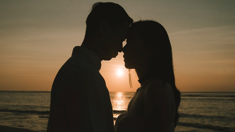 Silhouette couple during a sunset proposal photography session at Anantara Uluwatu Bali Resort.