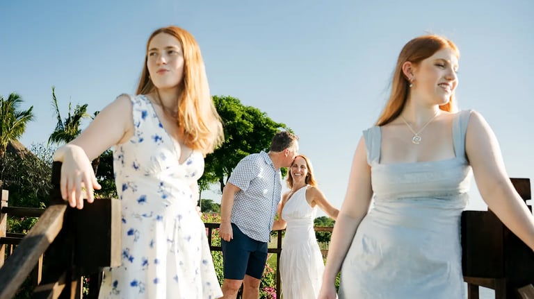 Sisters walking together during a relaxed family photography session at AYANA Resort Bali