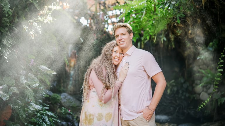 Couple portrait at Umbul Sari Water Garden during a scenic family photography session in Bali