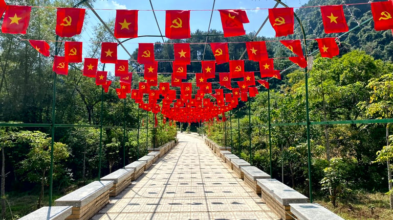 a bridge with flags and flags hanging from the side