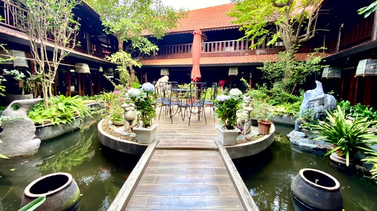 a wooden walkway leading to a wooden deck