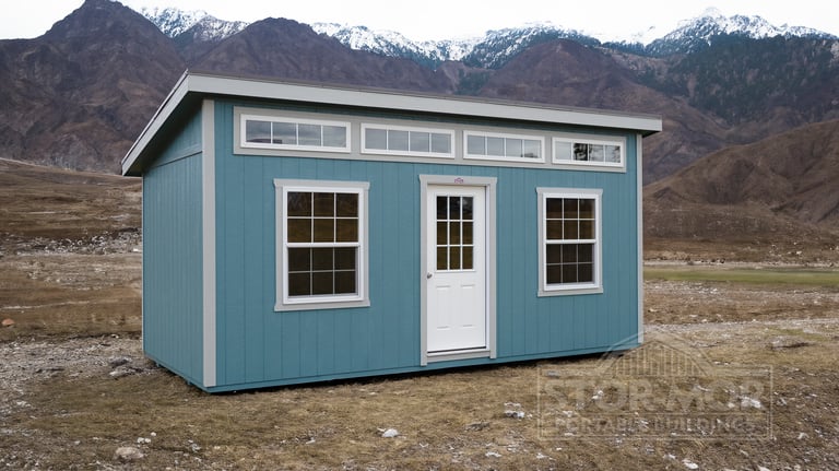 Modern blue shed studio with transom windows - Backyard office shed