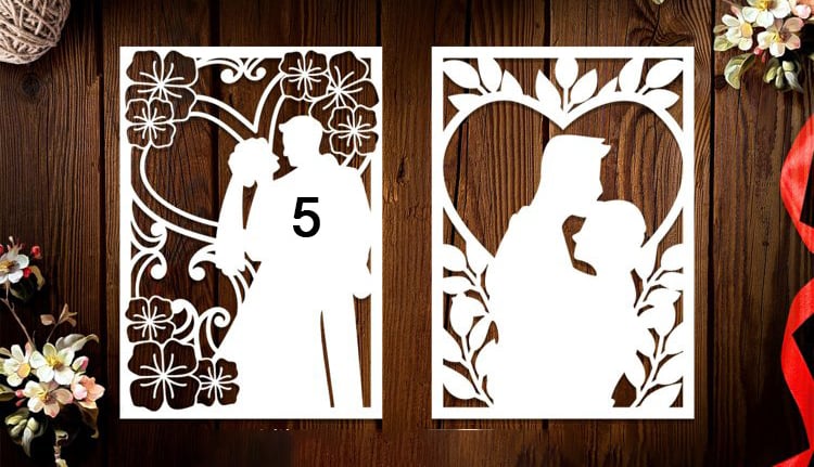 a couple of paper cutouts of a wedding couple