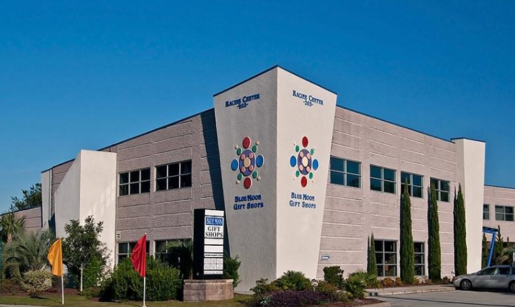 The Blue Moon Gift Shops exterior storefront at Racine Center in Wilmington, North Carolina.