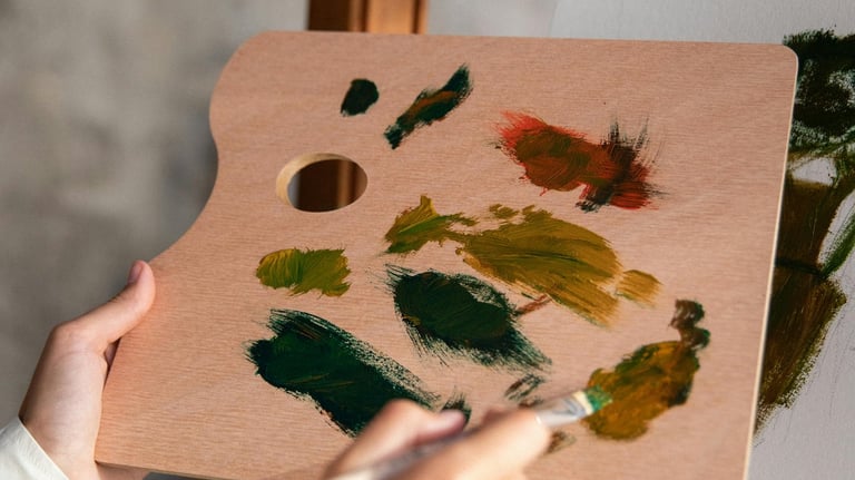 a woman is painting with a paintbrush and a brush