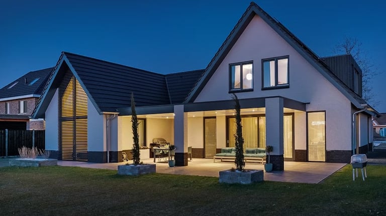 a house with a large backyard area and a patio area