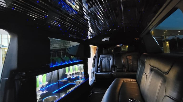 Interior of luxury limo (leather seats, lights)