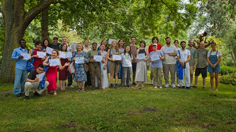 Participants of the MDT Documentary Impact Challenge pose with certificates and teachers