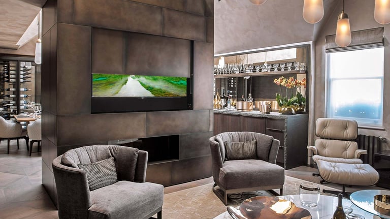 Automated ceiling flip-down TV mount for an invisible tech finish in London