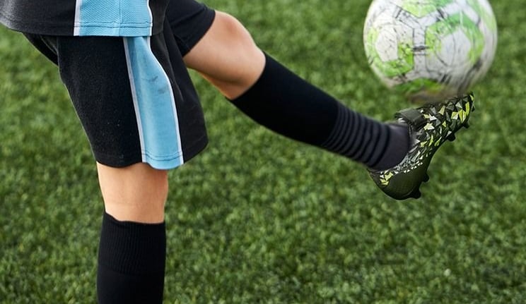 Outdoor sports gear arranged on ground