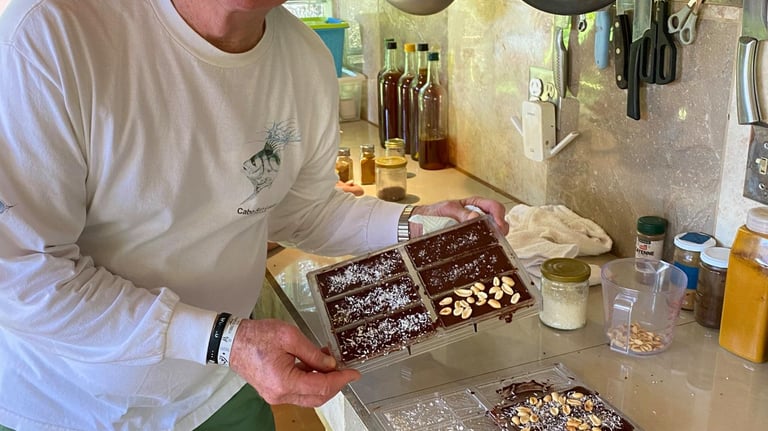 A Reina's Chocolate Master Class participant showing off his chocolate bars