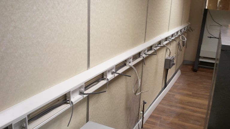 Commercial dado trunking and electrical wiring installation in a Dartford business unit