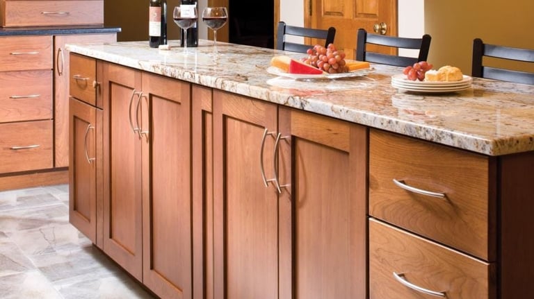 Modern wood kitchen cabinets with solid granite countertops. Kitchen cabinets and flooring.