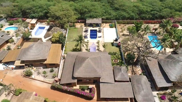 a house with a pool and a swimming pool