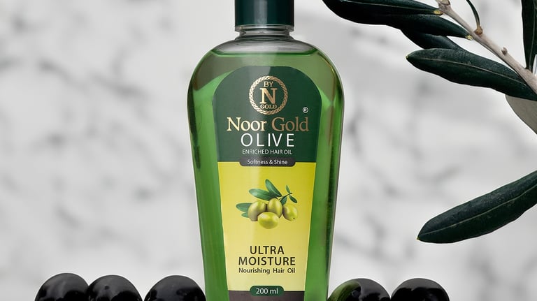 Product photography of green olive oil bottle with olives and marble background